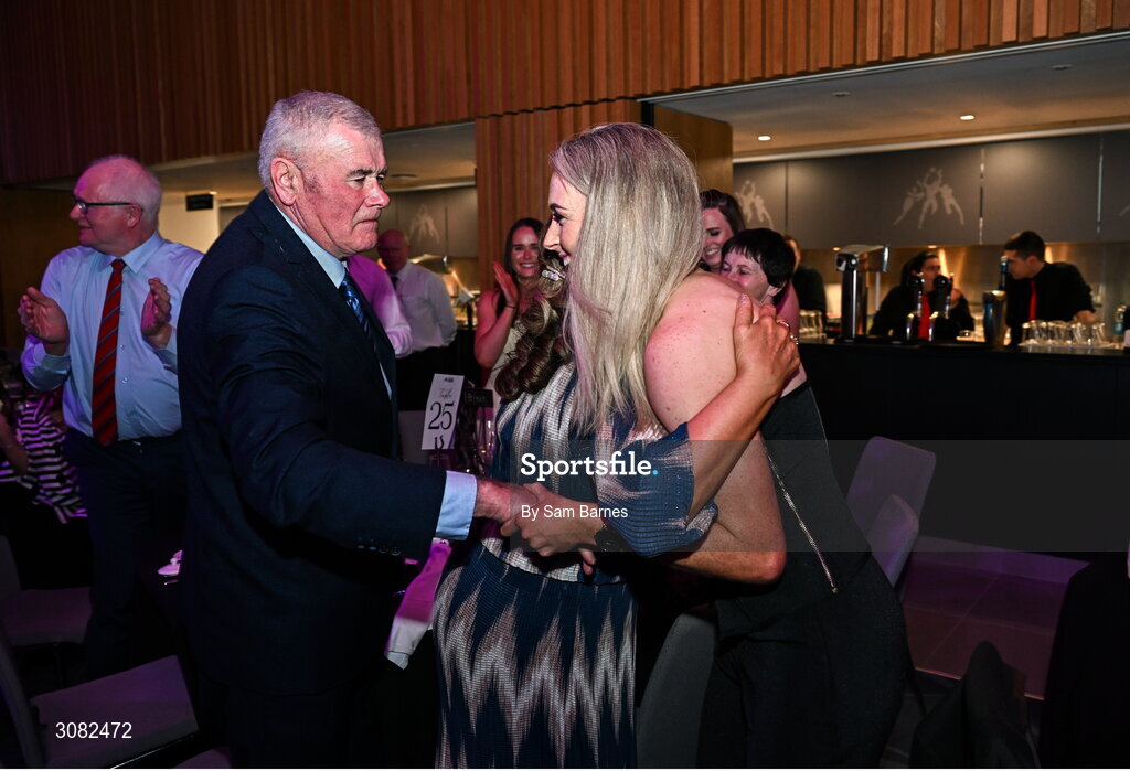 21 March 2025; 2024 AIB Ladies Gaelic Football Club Championship Player of the Year, Louise Ward of Kilkerrin-Clonberne, centre, is congratulated by friends and family as she makes her way to the stage to collect her award during the AIB Club Player Awards at Croke Park in Dublin. The AIB Club Player Awards celebrated the best players from club Football, Hurling, Camogie, and LGFA in a single ceremony for the first time, recognising their outstanding achievements on the field throughout the season. Photo by Sam Barnes/Sportsfile