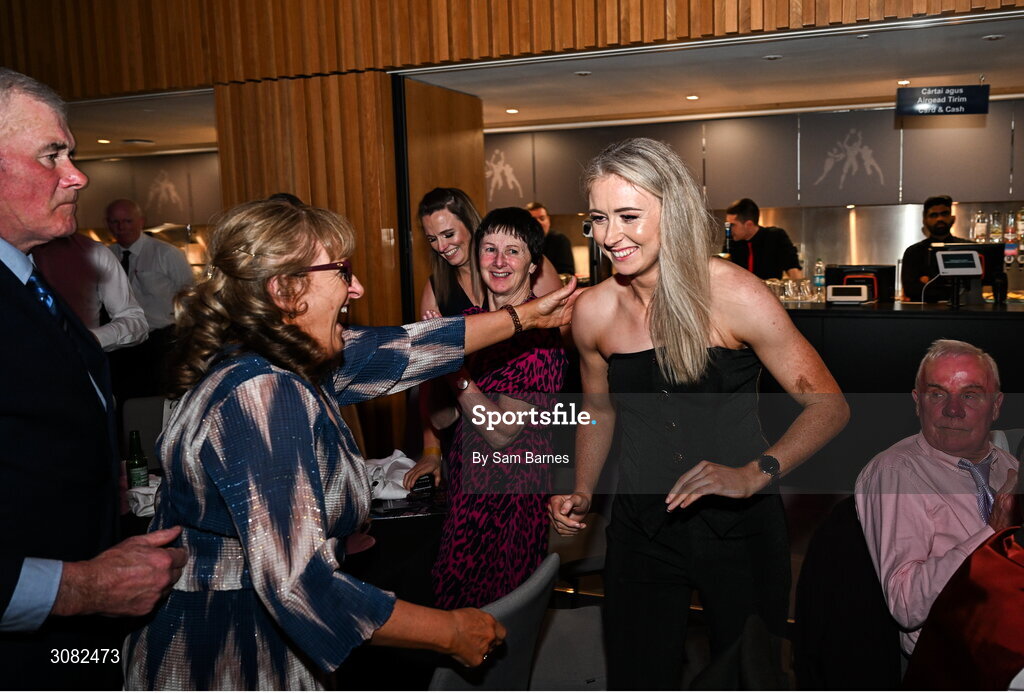 21 March 2025; 2024 AIB Ladies Gaelic Football Club Championship Player of the Year, Louise Ward of Kilkerrin-Clonberne, centre, is congratulated by friends and family as she makes her way to the stage to collect her award during the AIB Club Player Awards at Croke Park in Dublin. The AIB Club Player Awards celebrated the best players from club Football, Hurling, Camogie, and LGFA in a single ceremony for the first time, recognising their outstanding achievements on the field throughout the season. Photo by Sam Barnes/Sportsfile