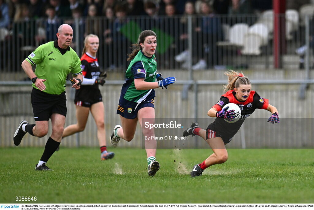 26 March 2025; Kate Jones of Coláiste Muire Ennis in action against Asha Connolly of Bailieborough Community School during the Lidl LGFA PPS All-Ireland Senior C final match between Bailieborough Community School of Cavan and Coláiste Muire of Clare at Geraldine Park in Athy, Kildare. Photo by Piaras Ó Mídheach/Sportsfile