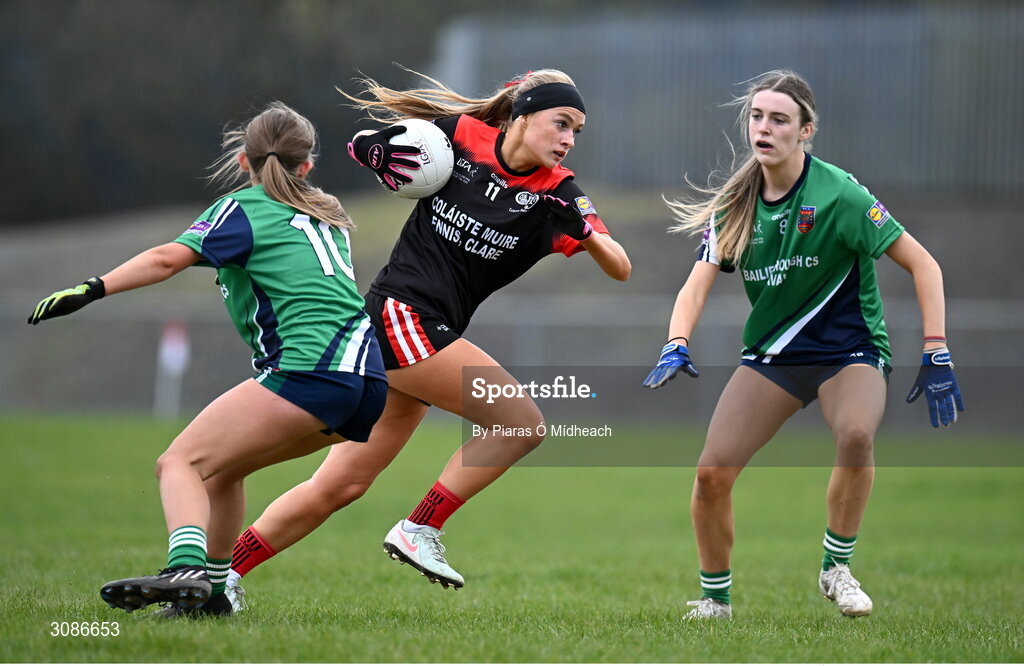26 March 2025; Ria Meaney of Coláiste Muire Ennis in action against Kayleigh Browne, left, and Gia McCabe of Bailieborough Community School during the Lidl LGFA PPS All-Ireland Senior C final match between Bailieborough Community School of Cavan and Coláiste Muire of Clare at Geraldine Park in Athy, Kildare. Photo by Piaras Ó Mídheach/Sportsfile