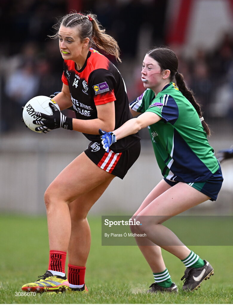 26 March 2025; Eabha O'Driscoll of Coláiste Muire Ennis in action against Aoife Rogers of Bailieborough Community School during the Lidl LGFA PPS All-Ireland Senior C final match between Bailieborough Community School of Cavan and Coláiste Muire of Clare at Geraldine Park in Athy, Kildare. Photo by Piaras Ó Mídheach/Sportsfile