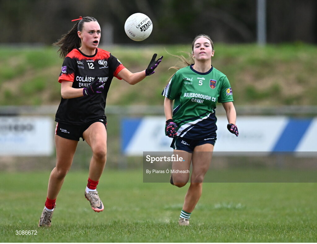 26 March 2025; Amy Reynolds of Coláiste Muire Ennis in action against Amber Filby of Bailieborough Community School during the Lidl LGFA PPS All-Ireland Senior C final match between Bailieborough Community School of Cavan and Coláiste Muire of Clare at Geraldine Park in Athy, Kildare. Photo by Piaras Ó Mídheach/Sportsfile