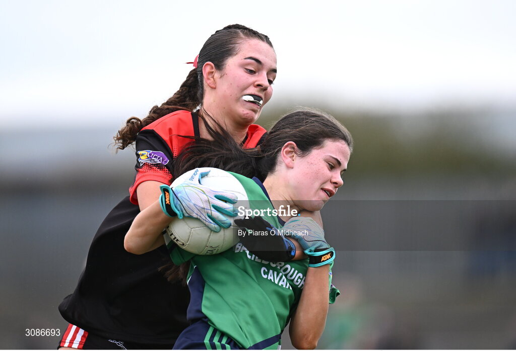 26 March 2025; Caoimhe Brady of Bailieborough Community School in action against Aine McGann of Coláiste Muire Ennis during the Lidl LGFA PPS All-Ireland Senior C final match between Bailieborough Community School of Cavan and Coláiste Muire of Clare at Geraldine Park in Athy, Kildare. Photo by Piaras Ó Mídheach/Sportsfile