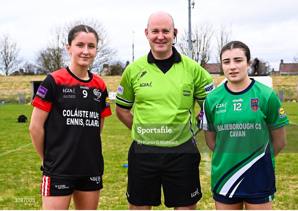 26 March 2025; Referee Shane Curley with team captains Lucy Power of Coláiste Muire Ennis and Ella Sheridan of Bailieborough Community School before the Lidl LGFA PPS All-Ireland Senior C final match between Bailieborough Community School of Cavan and Coláiste Muire of Clare at Geraldine Park in Athy, Kildare. Photo by Piaras Ó Mídheach/Sportsfile
