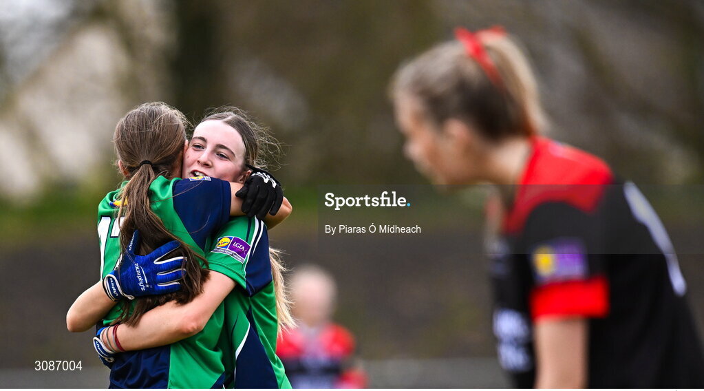26 March 2025; Bailieborough Community School players Gia McCabe and Siún O'Sullivan, left, celebrate after their side's victory in the Lidl LGFA PPS All-Ireland Senior C final match between Bailieborough Community School of Cavan and Coláiste Muire of Clare at Geraldine Park in Athy, Kildare. Photo by Piaras Ó Mídheach/Sportsfile