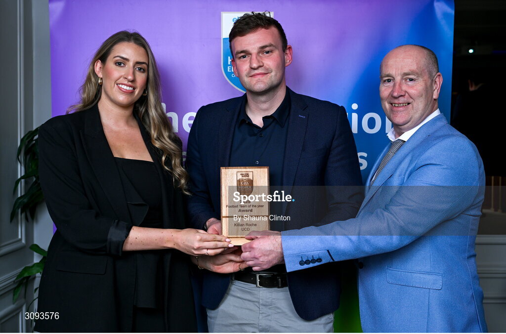 31 March 2025; University College Dublin player Killian Roche, centre, is presented with his 2025 Electric Ireland Higher Education GAA Football Rising Stars Team of the Year award by Electric Ireland Sponsorship Manager Sarah Gelletlie, left, and Higher Education GAA Chairperson Benny Hurl during the Electric Ireland Higher Education Rising Stars Awards at Castleknock Hotel in Dublin. Photo by Shauna Clinton/Sportsfile