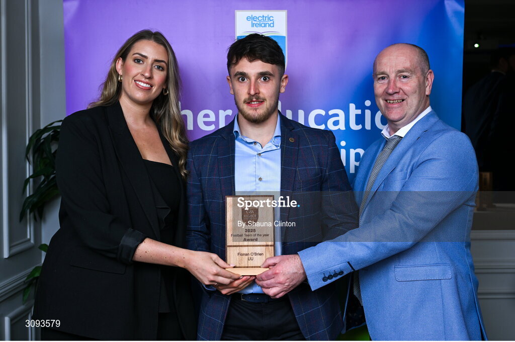 31 March 2025; Ulster University player Fionnan O’Brien, centre, is presented with his 2025 Electric Ireland Higher Education GAA Football Rising Stars Team of the Year award by Electric Ireland Sponsorship Manager Sarah Gelletlie, left, and Higher Education GAA Chairperson Benny Hurl during the Electric Ireland Higher Education Rising Stars Awards at Castleknock Hotel in Dublin. Photo by Shauna Clinton/Sportsfile