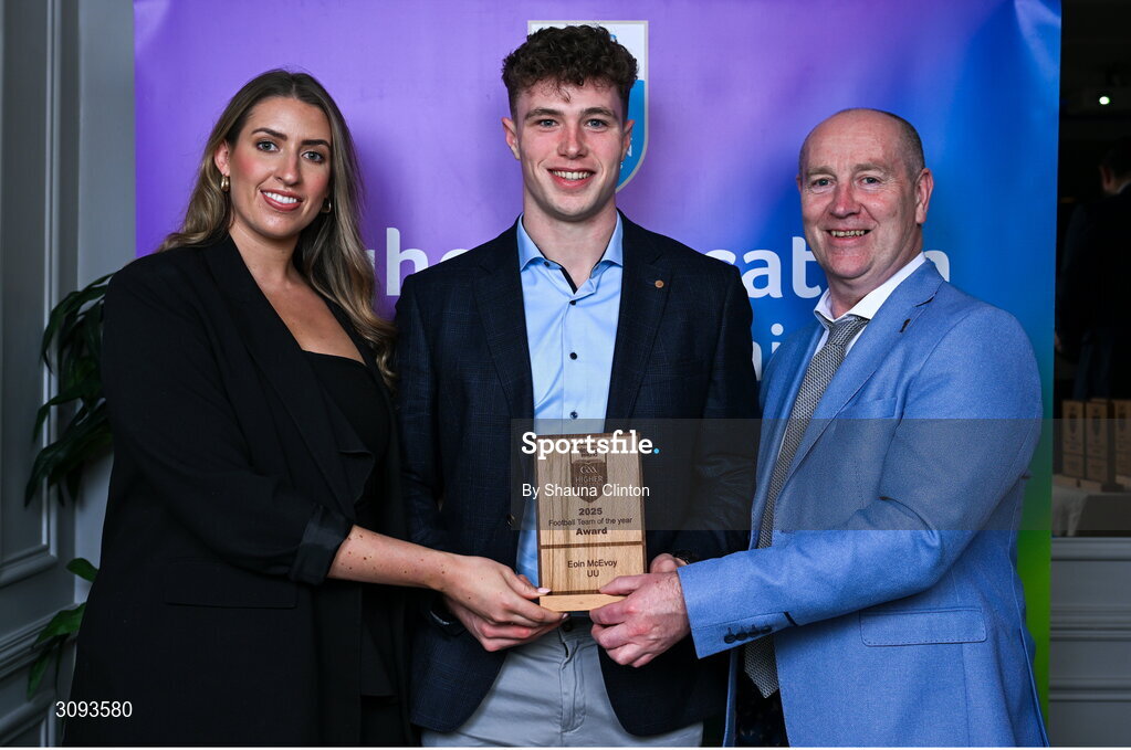 31 March 2025; Ulster University player Eoin Mc Evoy, centre, is presented with his 2025 Electric Ireland Higher Education GAA Football Rising Stars Team of the Year award by Electric Ireland Sponsorship Manager Sarah Gelletlie, left, and Higher Education GAA Chairperson Benny Hurl during the Electric Ireland Higher Education Rising Stars Awards at Castleknock Hotel in Dublin. Photo by Shauna Clinton/Sportsfile