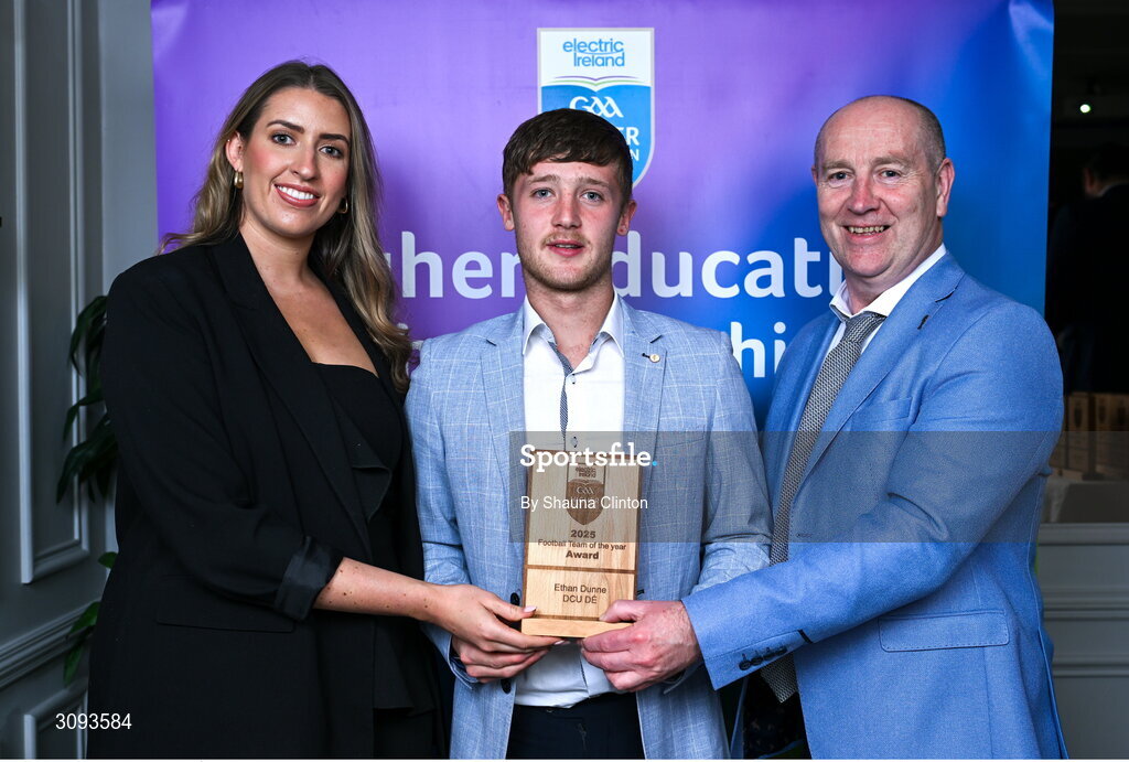 31 March 2025; Jonny Dunne, centre, brother of DCU Dóchas Éireann player Ethan Dunne, not pictured, accepts the 2025 Electric Ireland Higher Education GAA Football Rising Stars Team of the Year award on behalf of his brother, from Electric Ireland Sponsorship Manager Sarah Gelletlie, left, and Higher Education GAA Chairperson Benny Hurl during the Electric Ireland Higher Education Rising Stars Awards at Castleknock Hotel in Dublin. Photo by Shauna Clinton/Sportsfile