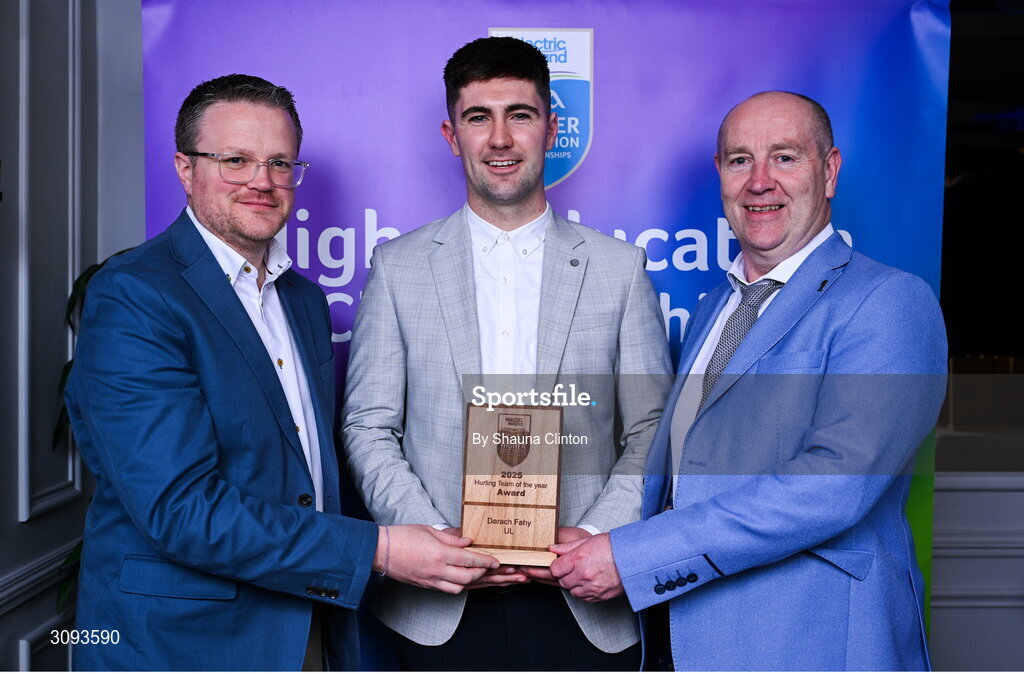 31 March 2025; University of Limerick player Darach Fahy, centre, is presented with his 2025 Electric Ireland Higher Education GAA Hurling Rising Stars Team of the Year award by Electric Ireland Group Sponsorship & PR Manager Rob Crabbe, left, and Higher Education GAA Chairperson Benny Hurl during the Electric Ireland Higher Education Rising Stars Awards at Castleknock Hotel in Dublin. Photo by Shauna Clinton/Sportsfile