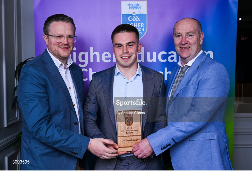 31 March 2025; Munster Technological University player Dara O'Sullivan, centre, is presented with his 2025 Electric Ireland Higher Education GAA Hurling Rising Stars Team of the Year award by Electric Ireland Group Sponsorship & PR Manager Rob Crabbe, left, and Higher Education GAA Chairperson Benny Hurl during the Electric Ireland Higher Education Rising Stars Awards at Castleknock Hotel in Dublin. Photo by Shauna Clinton/Sportsfile