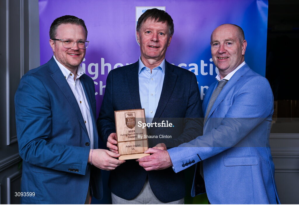 31 March 2025; University of Limerick manager Brian Ryan, centre, accepts the 2025 Electric Ireland Higher Education GAA Hurling Rising Stars Team of the Year award on behalf of University of Limerick player Adam English, not pictured, from Electric Ireland Group Sponsorship & PR Manager Rob Crabbe, left, and Higher Education GAA Chairperson Benny Hurl during the Electric Ireland Higher Education Rising Stars Awards at Castleknock Hotel in Dublin. Photo by Shauna Clinton/Sportsfile