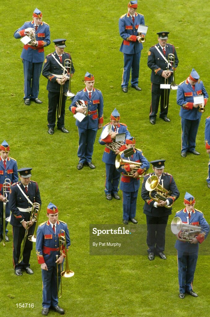 12 September 2004; The Artane Boys Band entertain the crowd before the game. Guinness All-Ireland Senior Hurling Championship Final, Cork v Kilkenny, Croke Park, Dublin. Picture credit; Pat Murphy / SPORTSFILE *** Local Caption *** Any photograph taken by SPORTSFILE during, or in connection with, the 2004 Guinness All-Ireland Hurling Final which displays GAA logos or contains an image or part of an image of any GAA intellectual property, or, which contains images of a GAA player/players in their playing uniforms, may only be used for editorial and non-advertising purposes.  Use of photographs for advertising, as posters or for purchase separately is strictly prohibited unless prior written approval has been obtained from the Gaelic Athletic Association.