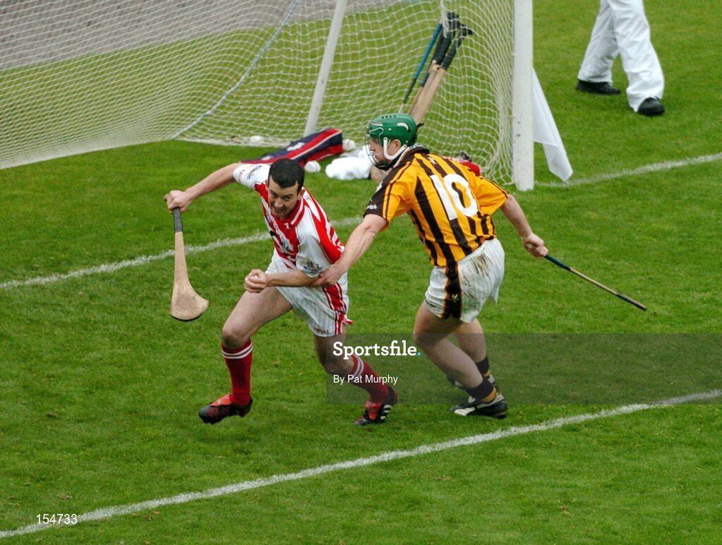 12 September 2004; Donal Og Cusack, Cork goalkeeper, in action against Henry Shefflin, Kilkenny. Guinness All-Ireland Senior Hurling Championship Final, Cork v Kilkenny, Croke Park, Dublin. Picture credit; Pat Murphy / SPORTSFILE *** Local Caption *** Any photograph taken by SPORTSFILE during, or in connection with, the 2004 Guinness All-Ireland Hurling Final which displays GAA logos or contains an image or part of an image of any GAA intellectual property, or, which contains images of a GAA player/players in their playing uniforms, may only be used for editorial and non-advertising purposes.  Use of photographs for advertising, as posters or for purchase separately is strictly prohibited unless prior written approval has been obtained from the Gaelic Athletic Association.