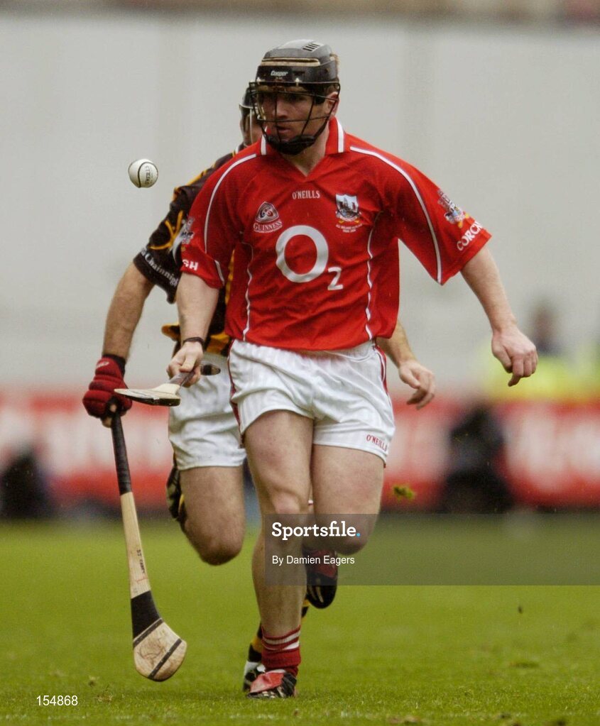 12 September 2004; Wayne Sherlock, Cork, in action against Kilkenny. Guinness All-Ireland Senior Hurling Championship Final, Cork v Kilkenny, Croke Park, Dublin. Picture credit; Damien Eagers / SPORTSFILE *** Local Caption *** Any photograph taken by SPORTSFILE during, or in connection with, the 2004 Guinness All-Ireland Hurling Final which displays GAA logos or contains an image or part of an image of any GAA intellectual property, or, which contains images of a GAA player/players in their playing uniforms, may only be used for editorial and non-advertising purposes.  Use of photographs for advertising, as posters or for purchase separately is strictly prohibited unless prior written approval has been obtained from the Gaelic Athletic Association.