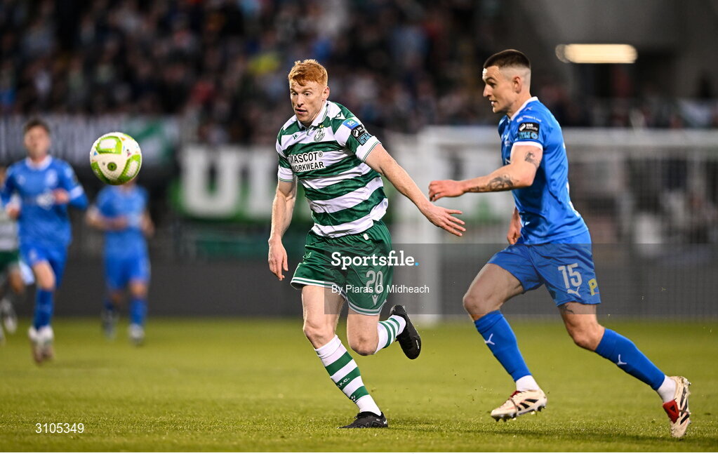 11 April 2025; Rory Gaffney of Shamrock Rovers in action against Darragh Leahy of Waterford during the SSE Airtricity Men's Premier Division match between Shamrock Rovers and Waterford at Tallaght Stadium in Dublin. Photo by Piaras Ó Mídheach/Sportsfile