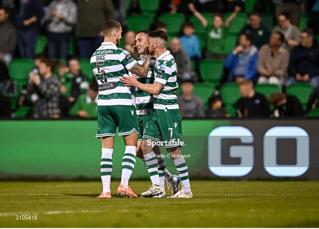 11 April 2025; Aaron McEneff of Shamrock Rovers, centre, celebrates with team-mates Lee Grace, left, and Dylan Watts after scoring their side's first goal during the SSE Airtricity Men's Premier Division match between Shamrock Rovers and Waterford at Tallaght Stadium in Dublin. Photo by Piaras Ó Mídheach/Sportsfile