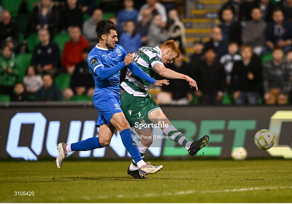 11 April 2025; Rory Gaffney of Shamrock Rovers shoots under pressure from Grant Horton of Waterford during the SSE Airtricity Men's Premier Division match between Shamrock Rovers and Waterford at Tallaght Stadium in Dublin. Photo by Piaras Ó Mídheach/Sportsfile