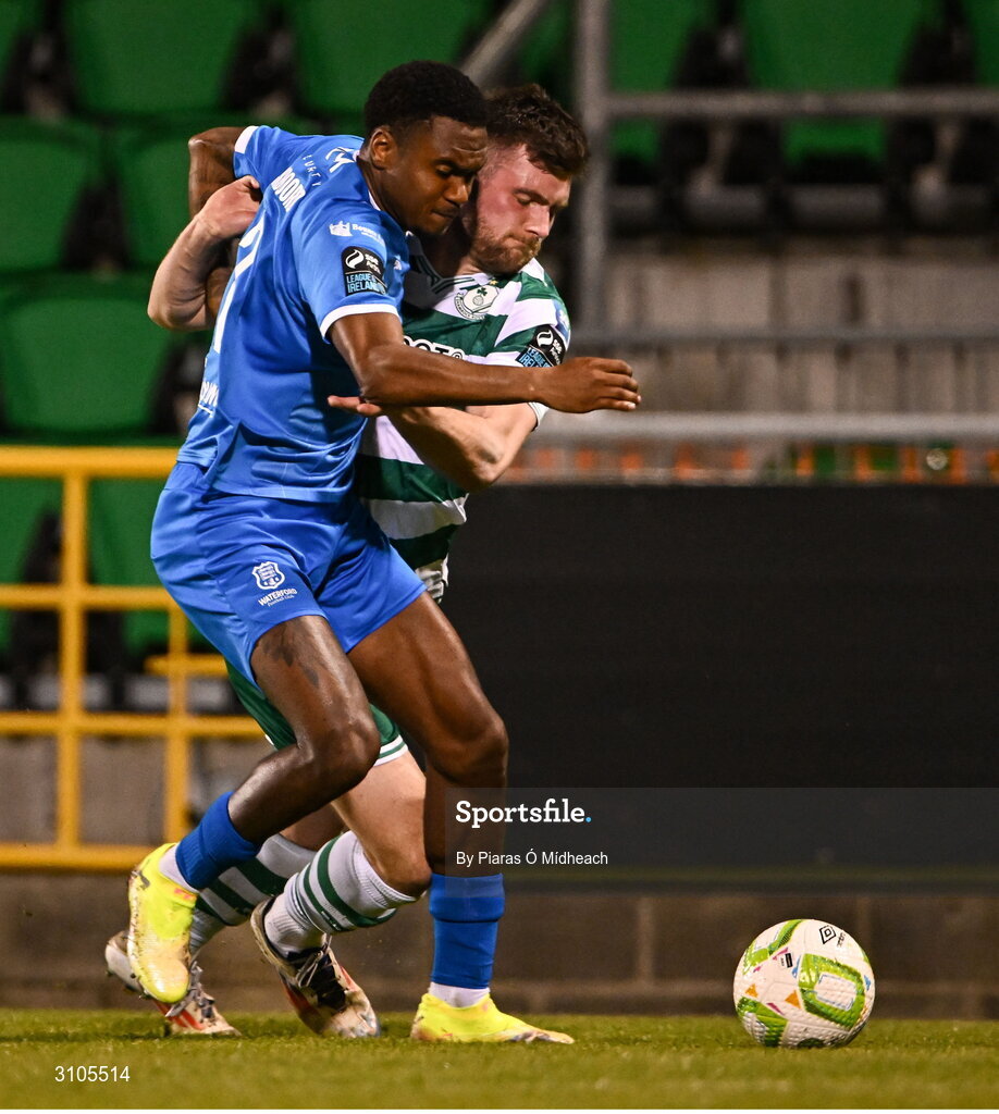 11 April 2025; Josh Honohan of Shamrock Rovers in action against Navajo Bakboord of Waterford during the SSE Airtricity Men's Premier Division match between Shamrock Rovers and Waterford at Tallaght Stadium in Dublin. Photo by Piaras Ó Mídheach/Sportsfile