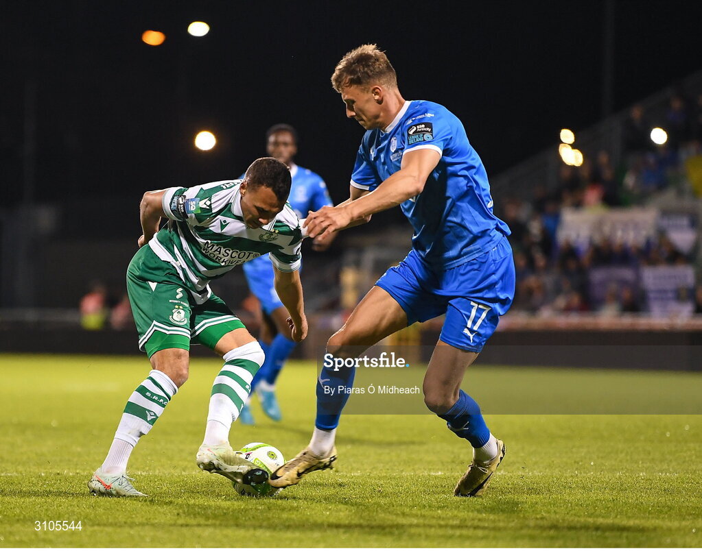 11 April 2025; Graham Burke of Shamrock Rovers in action against Kacper Radkowski of Waterford during the SSE Airtricity Men's Premier Division match between Shamrock Rovers and Waterford at Tallaght Stadium in Dublin. Photo by Piaras Ó Mídheach/Sportsfile