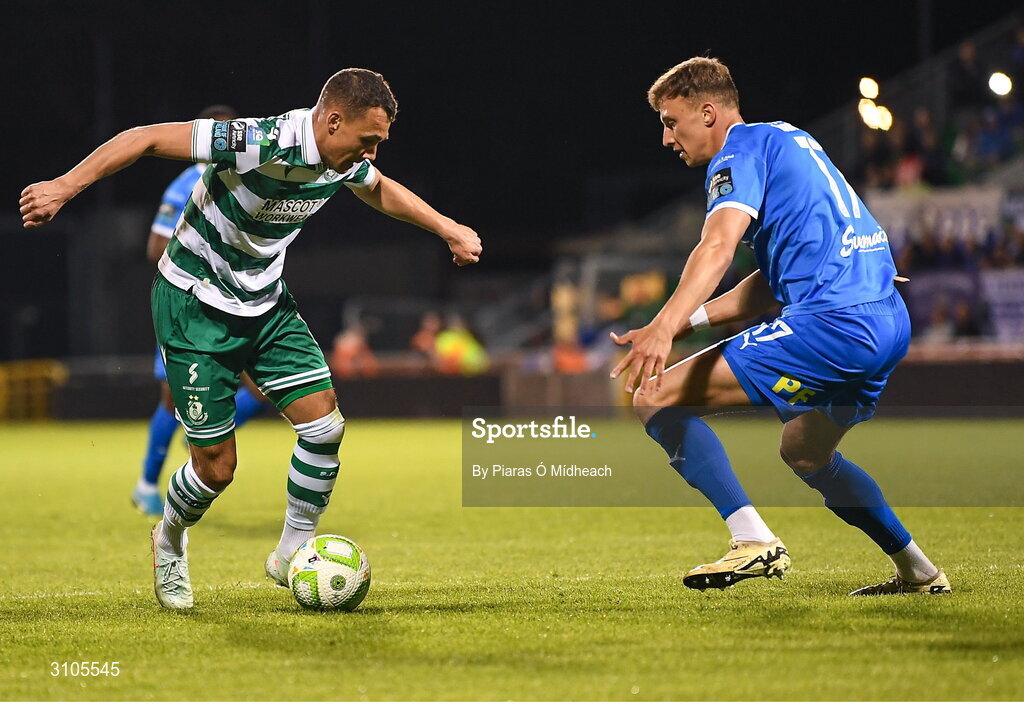 11 April 2025; Graham Burke of Shamrock Rovers in action against Kacper Radkowski of Waterford during the SSE Airtricity Men's Premier Division match between Shamrock Rovers and Waterford at Tallaght Stadium in Dublin. Photo by Piaras Ó Mídheach/Sportsfile