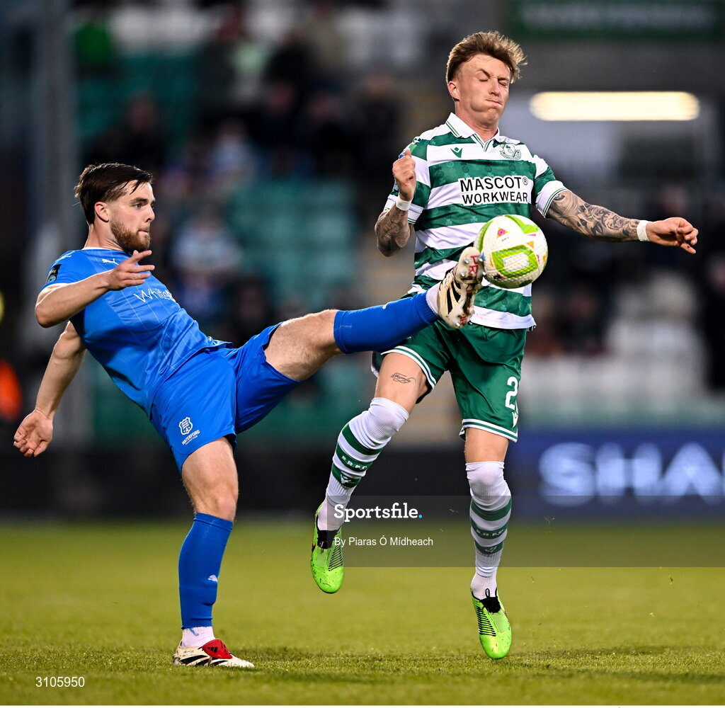 11 April 2025; Danny Grant of Shamrock Rovers in action against Ryan Burke of Waterford during the SSE Airtricity Men's Premier Division match between Shamrock Rovers and Waterford at Tallaght Stadium in Dublin. Photo by Piaras Ó Mídheach/Sportsfile