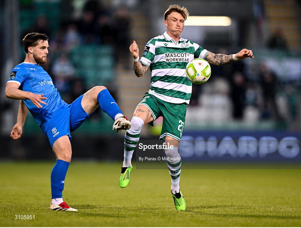 11 April 2025; Danny Grant of Shamrock Rovers in action against Ryan Burke of Waterford during the SSE Airtricity Men's Premier Division match between Shamrock Rovers and Waterford at Tallaght Stadium in Dublin. Photo by Piaras Ó Mídheach/Sportsfile