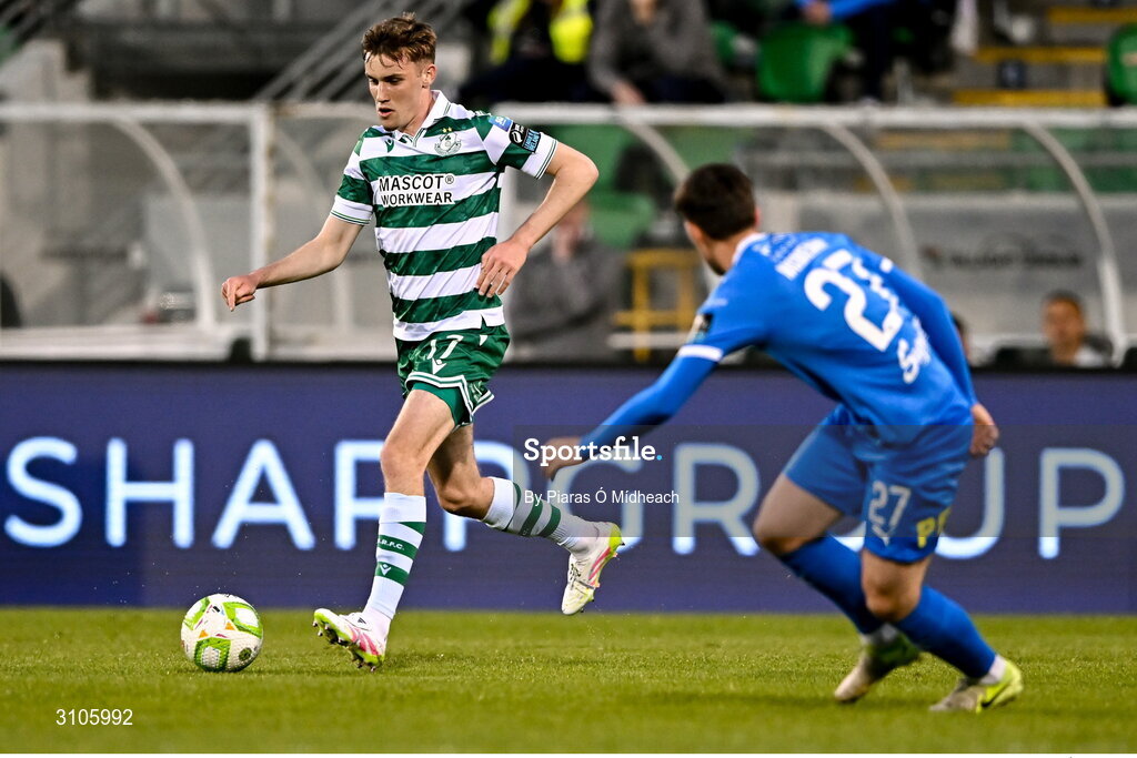 11 April 2025; Matt Healy of Shamrock Rovers in action against Dean McMenamy of Waterford during the SSE Airtricity Men's Premier Division match between Shamrock Rovers and Waterford at Tallaght Stadium in Dublin. Photo by Piaras Ó Mídheach/Sportsfile