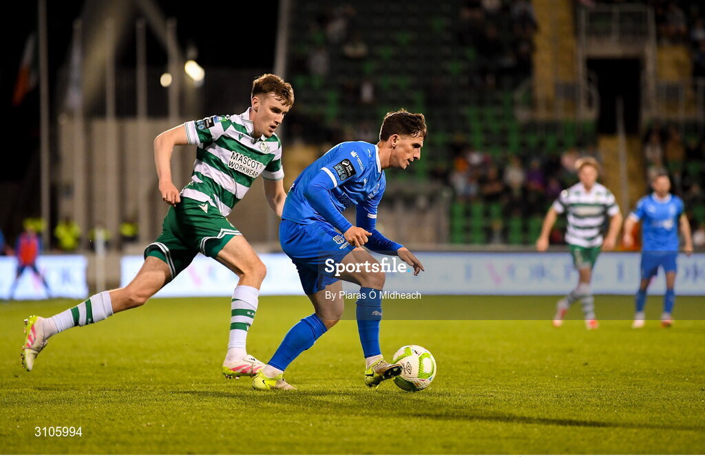 11 April 2025; Dean McMenamy of Waterford in action against Matt Healy of Shamrock Rovers during the SSE Airtricity Men's Premier Division match between Shamrock Rovers and Waterford at Tallaght Stadium in Dublin. Photo by Piaras Ó Mídheach/Sportsfile