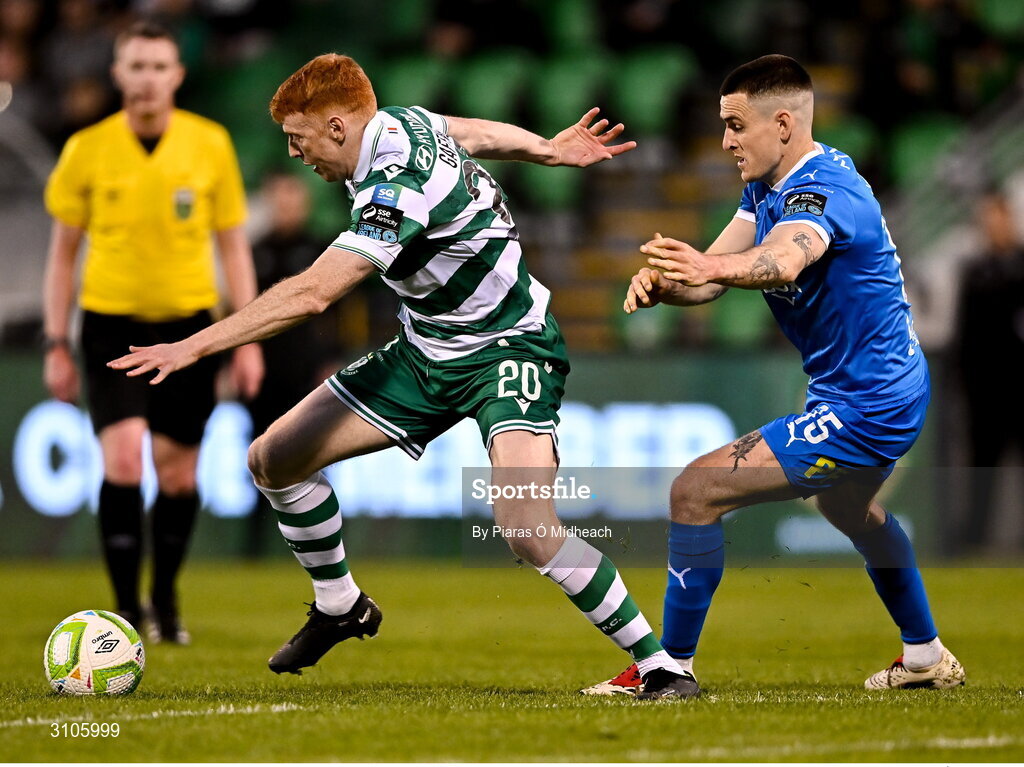 11 April 2025; Rory Gaffney of Shamrock Rovers in action against Darragh Leahy of Waterford during the SSE Airtricity Men's Premier Division match between Shamrock Rovers and Waterford at Tallaght Stadium in Dublin. Photo by Piaras Ó Mídheach/Sportsfile