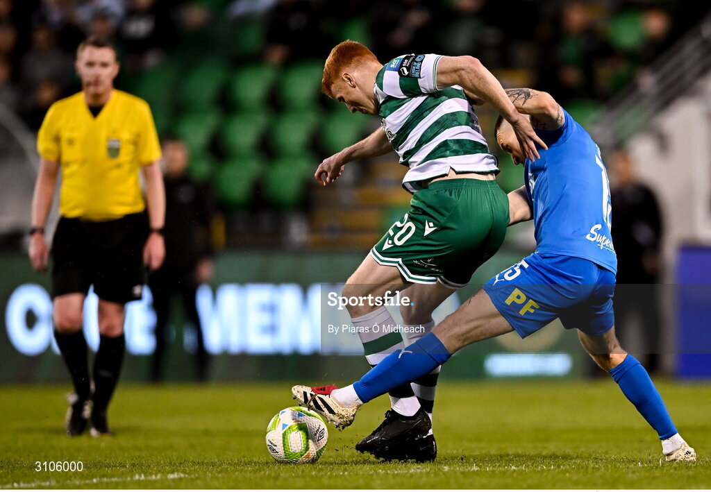 11 April 2025; Rory Gaffney of Shamrock Rovers in action against Darragh Leahy of Waterford during the SSE Airtricity Men's Premier Division match between Shamrock Rovers and Waterford at Tallaght Stadium in Dublin. Photo by Piaras Ó Mídheach/Sportsfile