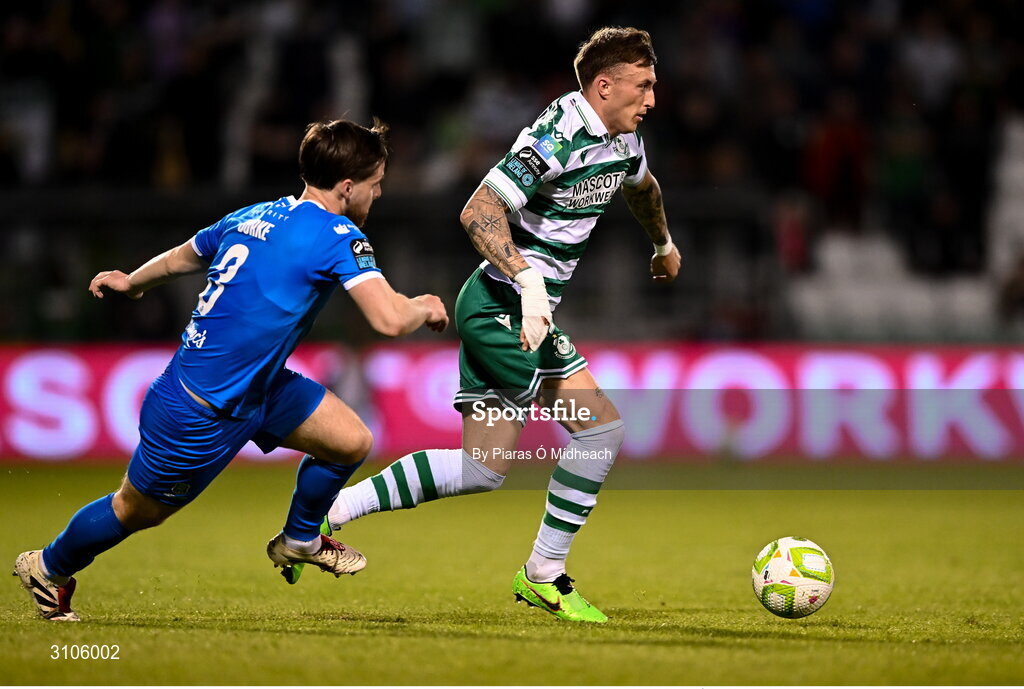 11 April 2025; Danny Grant of Shamrock Rovers in action against Ryan Burke of Waterford during the SSE Airtricity Men's Premier Division match between Shamrock Rovers and Waterford at Tallaght Stadium in Dublin. Photo by Piaras Ó Mídheach/Sportsfile