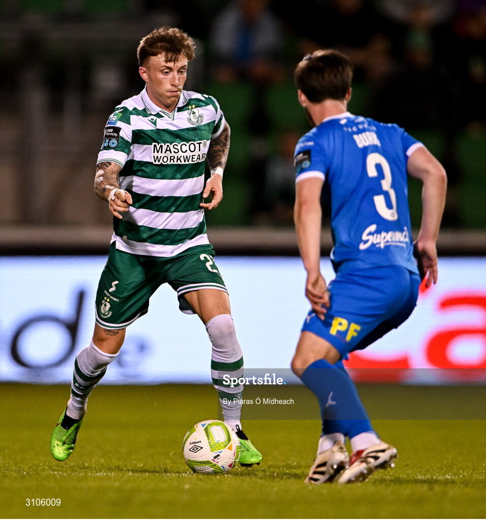 11 April 2025; Danny Grant of Shamrock Rovers in action against Ryan Burke of Waterford during the SSE Airtricity Men's Premier Division match between Shamrock Rovers and Waterford at Tallaght Stadium in Dublin. Photo by Piaras Ó Mídheach/Sportsfile
