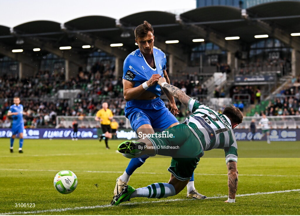 11 April 2025; Danny Grant of Shamrock Rovers in action against Kacper Radkowski of Waterford during the SSE Airtricity Men's Premier Division match between Shamrock Rovers and Waterford at Tallaght Stadium in Dublin. Photo by Piaras Ó Mídheach/Sportsfile