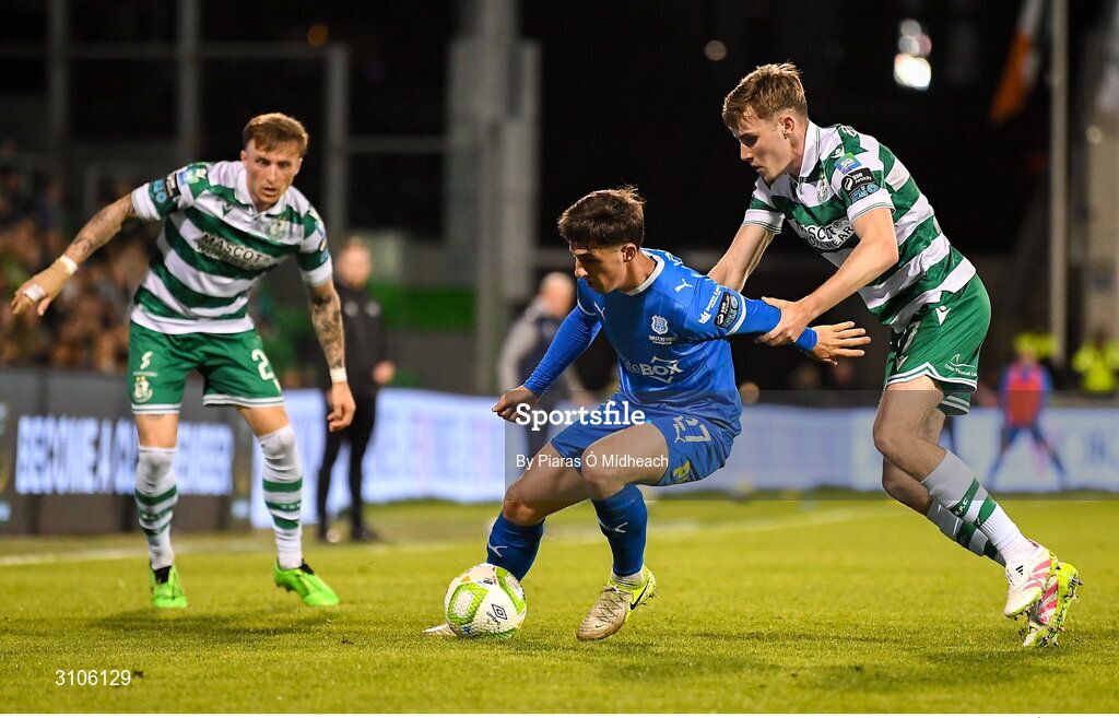 11 April 2025; Dean McMenamy of Waterford in action against Matt Healy of Shamrock Rovers during the SSE Airtricity Men's Premier Division match between Shamrock Rovers and Waterford at Tallaght Stadium in Dublin. Photo by Piaras Ó Mídheach/Sportsfile