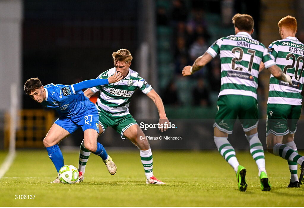 11 April 2025; Dean McMenamy of Waterford in action against Daniel Cleary of Shamrock Rovers during the SSE Airtricity Men's Premier Division match between Shamrock Rovers and Waterford at Tallaght Stadium in Dublin. Photo by Piaras Ó Mídheach/Sportsfile