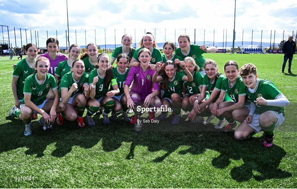 17 April 2025; Republic of Ireland players celebrate with the Bob Docherty Cup after their side's victory in the Girls U15 SAFIB Bob Docherty Cup match between Northern Ireland and Republic of Ireland at Greenisland FC in Antrim. Photo by Seb Daly/Sportsfile