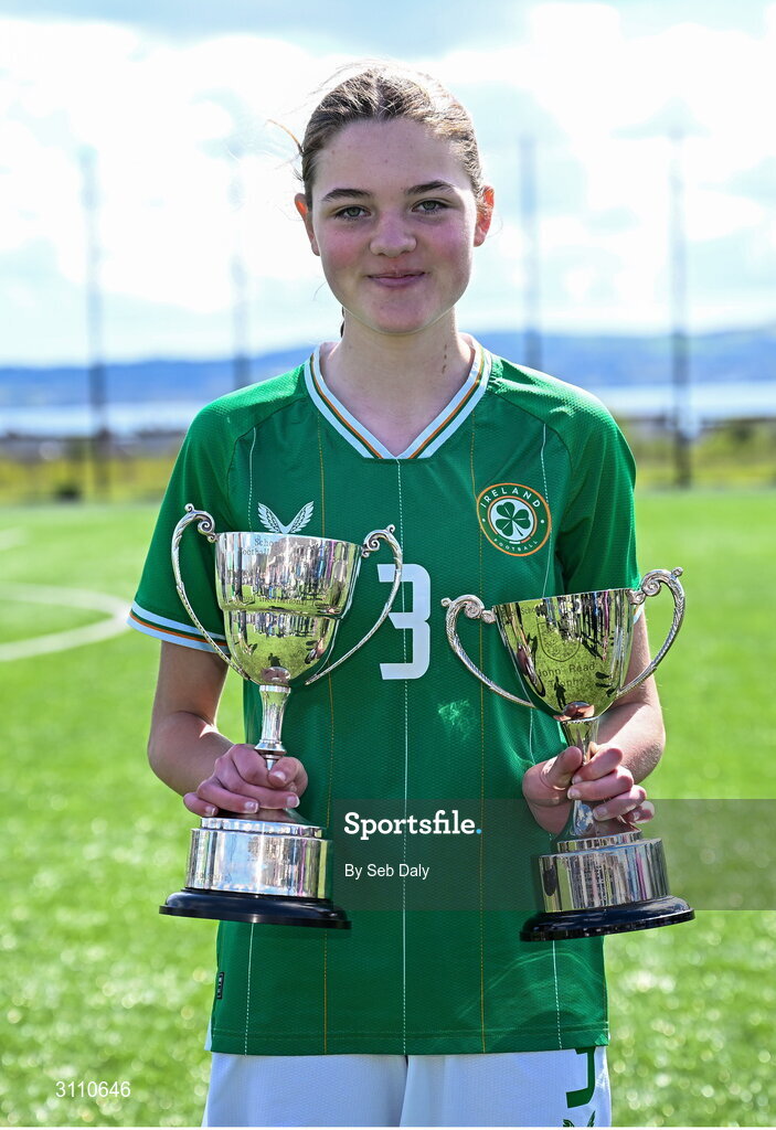 17 April 2025; Ava Hallinan of Republic of Ireland with the Bob Docherty Cup and the John Read Trophy after the Girls U15 SAFIB Bob Docherty Cup match between Northern Ireland and Republic of Ireland at Greenisland FC in Antrim. Photo by Seb Daly/Sportsfile