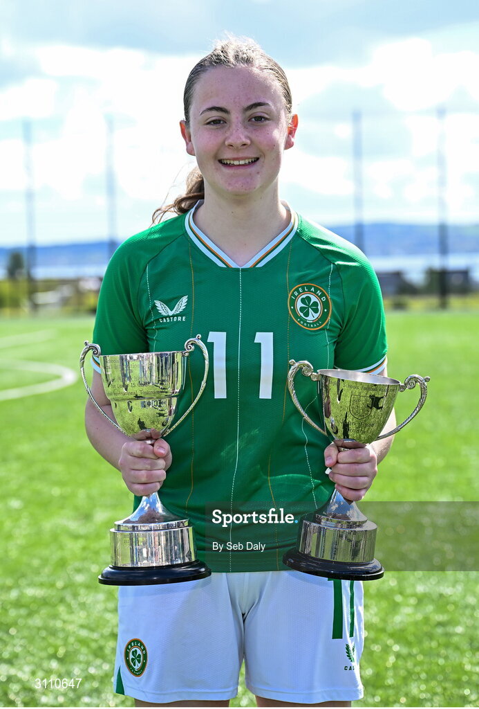 17 April 2025; Abbie Duffy of Republic of Ireland with the Bob Docherty Cup and the John Read Trophy after the Girls U15 SAFIB Bob Docherty Cup match between Northern Ireland and Republic of Ireland at Greenisland FC in Antrim. Photo by Seb Daly/Sportsfile
