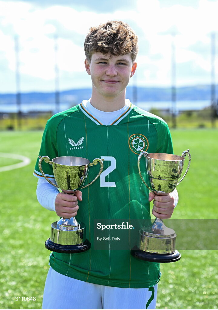 17 April 2025; Leah O’Leary Callender of Republic of Ireland with the Bob Docherty Cup and the John Read Trophy after the Girls U15 SAFIB Bob Docherty Cup match between Northern Ireland and Republic of Ireland at Greenisland FC in Antrim. Photo by Seb Daly/Sportsfile