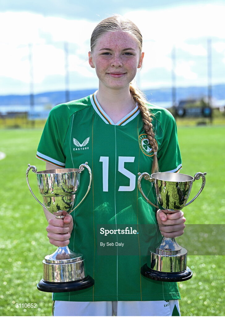 17 April 2025; Ava Kelly of Republic of Ireland with the Bob Docherty Cup and the John Read Trophy after the Girls U15 SAFIB Bob Docherty Cup match between Northern Ireland and Republic of Ireland at Greenisland FC in Antrim. Photo by Seb Daly/Sportsfile