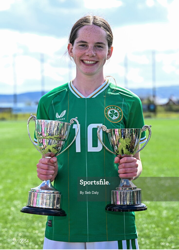 17 April 2025; Ellen Goggin of Republic of Ireland with the Bob Docherty Cup and the John Read Trophy after the Girls U15 SAFIB Bob Docherty Cup match between Northern Ireland and Republic of Ireland at Greenisland FC in Antrim. Photo by Seb Daly/Sportsfile