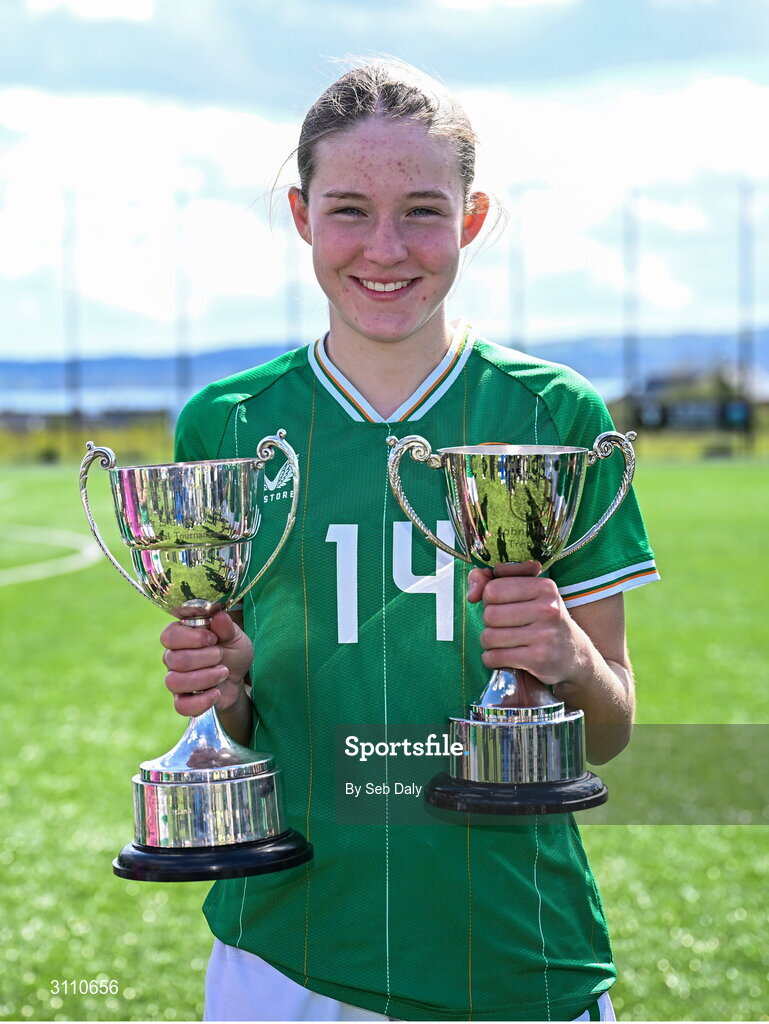 17 April 2025; Hailey Twomey of Republic of Ireland with the Bob Docherty Cup and the John Read Trophy after the Girls U15 SAFIB Bob Docherty Cup match between Northern Ireland and Republic of Ireland at Greenisland FC in Antrim. Photo by Seb Daly/Sportsfile