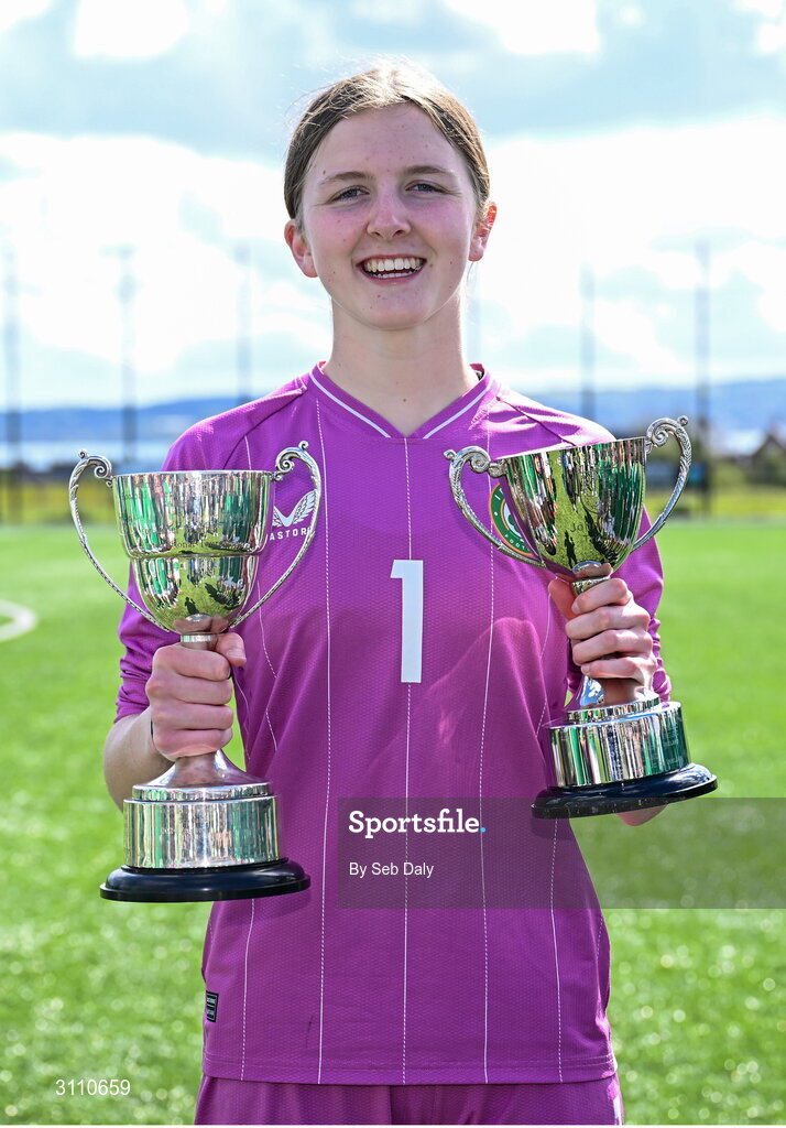 17 April 2025; Republic of Ireland goalkeeper Sarah Doyle with the Bob Docherty Cup and the John Read Trophy after the Girls U15 SAFIB Bob Docherty Cup match between Northern Ireland and Republic of Ireland at Greenisland FC in Antrim. Photo by Seb Daly/Sportsfile