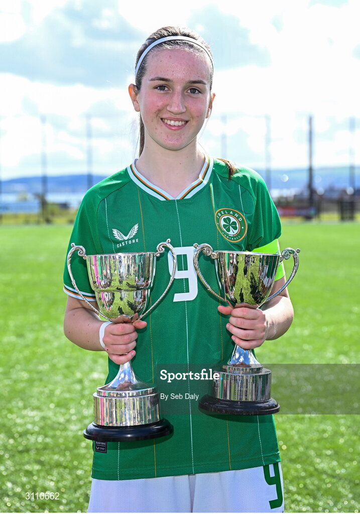 17 April 2025; Ciara Milton of Republic of Ireland with the Bob Docherty Cup and the John Read Trophy after the Girls U15 SAFIB Bob Docherty Cup match between Northern Ireland and Republic of Ireland at Greenisland FC in Antrim. Photo by Seb Daly/Sportsfile