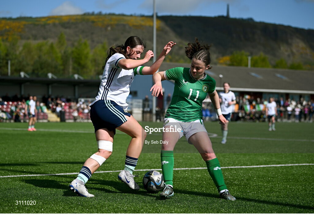 17 April 2025; Abbie Duffy of Republic of Ireland in action against Ellie-Mae Turner of Northern Ireland during the Girls U15 SAFIB Bob Docherty Cup match between Northern Ireland and Republic of Ireland at Greenisland FC in Antrim. Photo by Seb Daly/Sportsfile