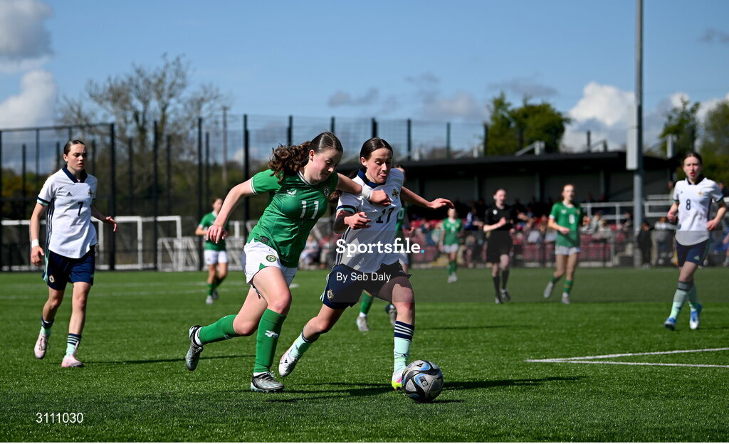 17 April 2025; Abbie Duffy of Republic of Ireland in action against Grace Murray of Northern Ireland during the Girls U15 SAFIB Bob Docherty Cup match between Northern Ireland and Republic of Ireland at Greenisland FC in Antrim. Photo by Seb Daly/Sportsfile