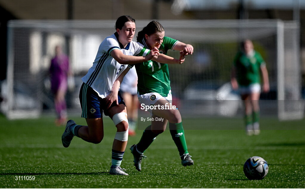 17 April 2025; Abbie Duffy of Republic of Ireland in action against Ellie-Mae Turner of Northern Ireland during the Girls U15 SAFIB Bob Docherty Cup match between Northern Ireland and Republic of Ireland at Greenisland FC in Antrim. Photo by Seb Daly/Sportsfile