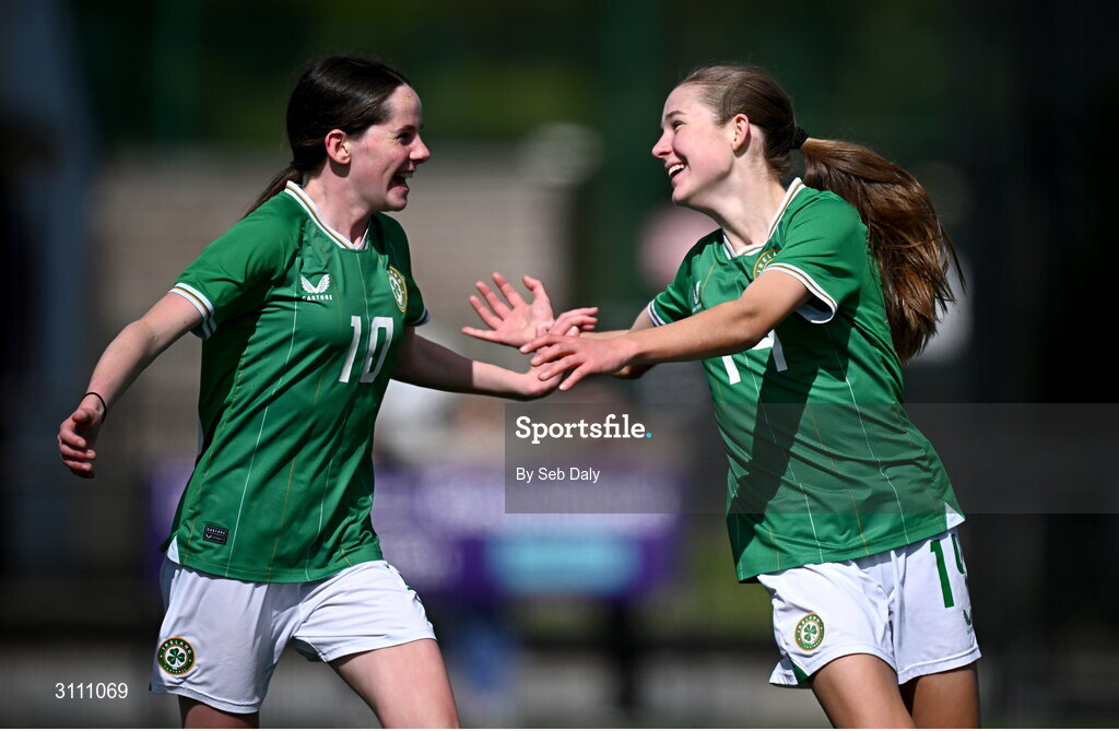 17 April 2025; Hailey Twomey of Republic of Ireland, right, celebrates with teammate \.10 after scoring their side's second goal during the Girls U15 SAFIB Bob Docherty Cup match between Northern Ireland and Republic of Ireland at Greenisland FC in Antrim. Photo by Seb Daly/Sportsfile