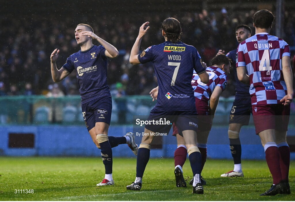 18 April 2025; Evan Caffrey of Shelbourne, left, reacts after a missed opportunity on goal during the SSE Airtricity Men's Premier Division match between Drogheda United and Shelbourne at Sullivan & Lambe Park in Drogheda, Louth. Photo by Ben McShane/Sportsfile